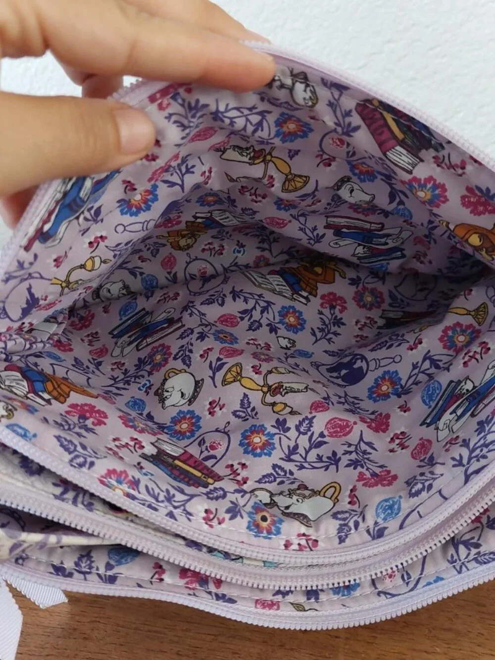Vera Bradley x Disney triple compartment crossbody bag features the 